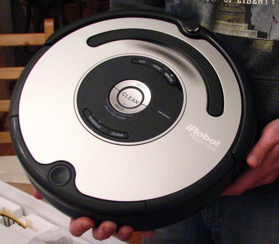 Me holding the Roomba