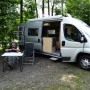 Relaxing in front of the van