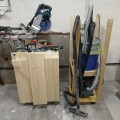 Vacuum and Miter Saw stowed away against the wall